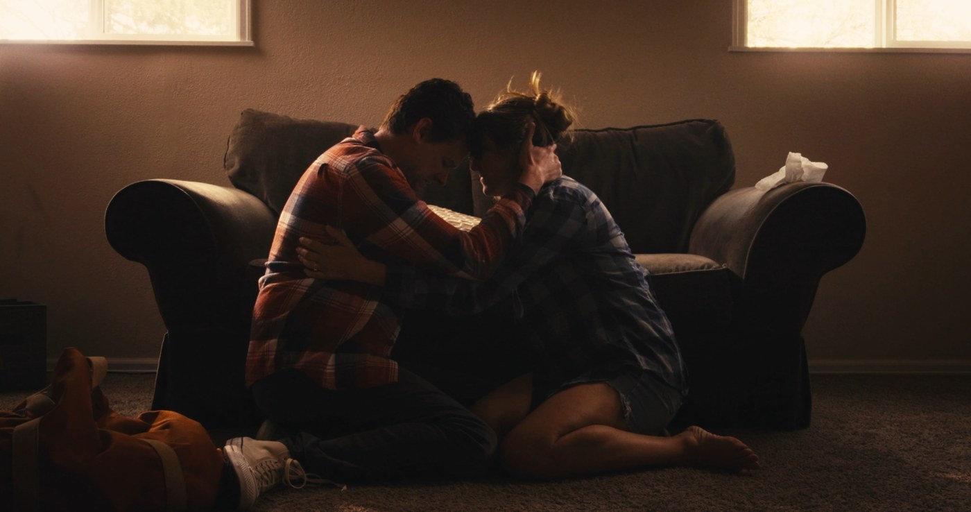 Milo and Maggie embrace in Junction.