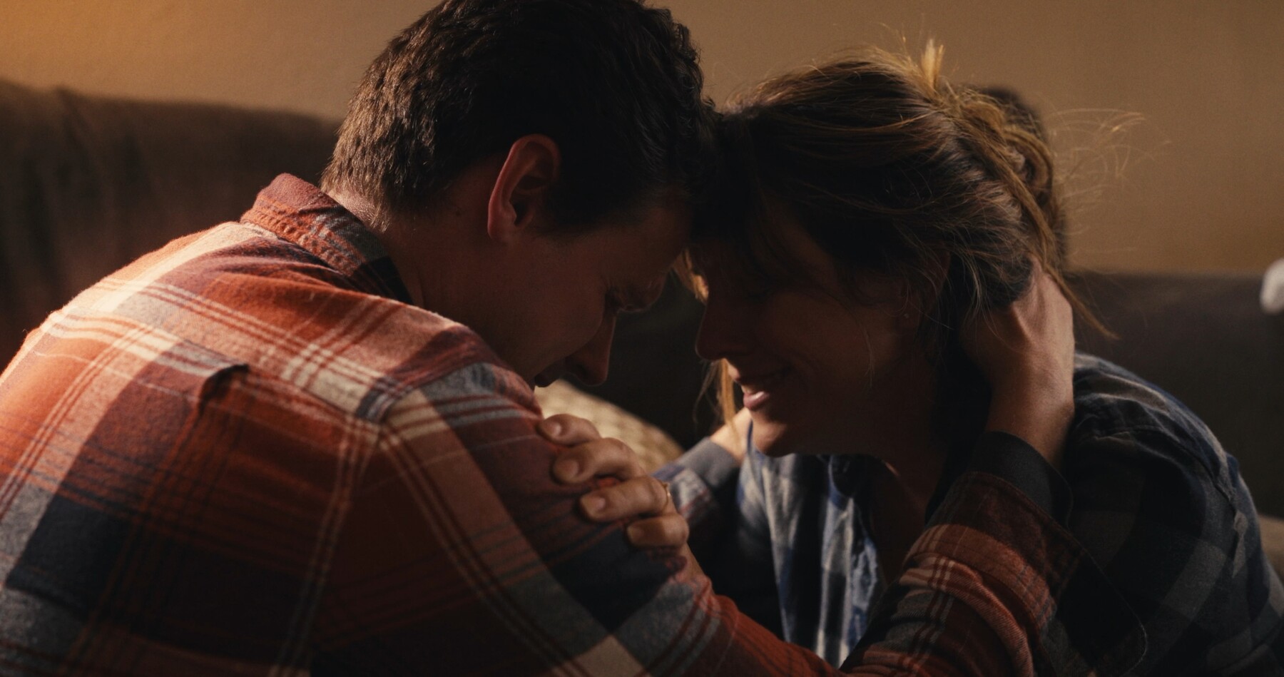 Maggie and Milo embrace forehead to forehead, her face lit with tears and relief.